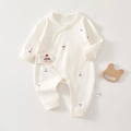 Macro detail of cream baby cotton romper featuring colorful mountain print and snap buttons - 52 / Christmas Hat