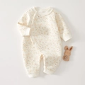 Detail of quilted cotton baby romper with floral bunny print and side snap closure - Size 59 / Vibrant Bunny (24054)