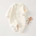 Detailed macro view of quilted cotton baby romper with cute bear and floral prints - Size 59 / Yellow Bear (24054)
