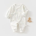 Newborn cotton romper with floral pattern and wrap-around tie closure in white - Colorful Leaves