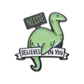 Green Nessie enamel pin featuring Nessie Believes In You text on white background - Nessie Slogan (XZ9593)