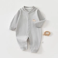 Detail of baby long sleeve romper featuring ribbed cotton texture and cute puppy embroidery - Size 59 / Blue