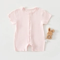 Close-up of soft pink baby romper with snap buttons and clear fabric texture detail - Light Pink