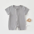 Flat lay of gray cotton baby romper with snap button closure and small wooden toy - Light Gray