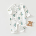 Detail of soft cotton baby romper with blue dinosaur prints and side-tie closure - 52 / Dinosaur