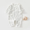 Detail of baby cotton romper with side ties and delicate yellow floral patterns - 52 / Daisy