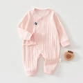 Detail of soft pink cotton baby romper with fine ribbed texture and bow tie closure - 52cm / Crown Pink