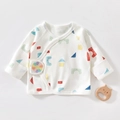 Detail of newborn organic cotton wrap top featuring colorful geometric prints and sunflower patch - 52cm / Colorful Blocks (White)