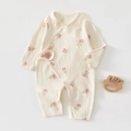 Detail of newborn floral baby romper showing soft seersucker fabric and snap closures - 52 / Pink Small Floral
