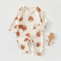 Detail of newborn long sleeve romper showing soft textured fabric and plush bear head decor - 52 / Brown Bear