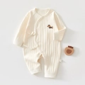 Detail of ribbed cotton baby romper with dachshund embroidery and side tie closure - Dachshund Yellow