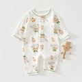 Detail of baby romper featuring cartoon elephant prints and snap buttons on soft cotton fabric - Size 59 / Green Elephant