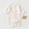 Detailed flat lay of baby cotton romper with pink heart print and wooden bear toy - Heart (Back Mesh Long Sleeve) / Size 59