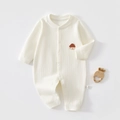Dettaglio tutina per neonati in cotone a coste color crema con ricamo a forma di casetta - Taglia 59 / Bianco Latte