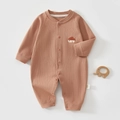 Detail of ribbed knit baby bodysuit with house embroidery and secure snap buttons - Size 59 / Acorn