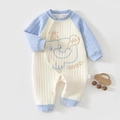 Detailed view of the snap buttons and knit texture on this blue elephant baby romper - 59 / Blue Elephant Pattern