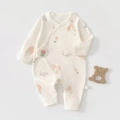Close-up of soft cotton newborn romper with bear cherry print and side snap buttons - 52cm / Cream Bear Cherry