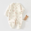 Detail eines gesteppten Baby-Einteilers mit rosa Tulpen und süßen Hasenmustern - Größe 59 / Rosa Blume Hase