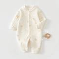 Detailed view of cream baby romper with elephant prints and ribbed cotton texture - Elephant Print