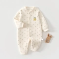 Close-up of quilted newborn romper featuring pineapple embroidery and waffle texture details - Size 59 / Pineapple Print
