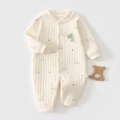 Detailed view of baby dinosaur cotton romper featuring cute green embroidery and rib knit texture - Size 59 / Dinosaur Print