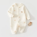 Close-up of cotton baby romper with squirrel print, embroidery and snap buttons - Squirrel Print