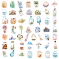 Detailansicht von 50 transparenten wasserfesten PET-Aufklebern mit handgezeichneten Cartoons - ins Transparente Objekte