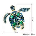 Detailed view of sea turtle brooch with blue crystals and green gemstones, size 5.1cm by 5.6cm - Multi-color Turtle (B030-A)
