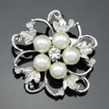 Elegant floral pearl brooch with silver petals and center crystal on a sleek dark background - White Floral Style (D001-A)