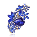 Exquisite golden floral brooch with a large pear-shaped blue crystal and rhinestones - 18K Royal Blue