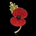 Close-up of poppy brooch with red, green and black rhinestones on gold-toned metal - AL014-A Red Enamel
