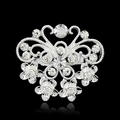 Silver alloy butterfly and floral brooch with clear crystals on a black background - Silver