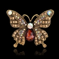 Broche papillon vintage dorée avec strass champagne et pierre goutte rouge - Style de Papillon Pierre Rouge Or Antique (B034-A)
