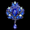 Spilla vintage a corona in lega d'argento con cristalli blu scuro e pendente - Argento e Blu