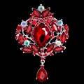 Spilla a corona color argento con cristallo rosso a goccia e strass lucidi - Argento e Rosso