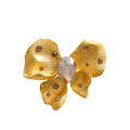 Spilla vintage a fiocco dorato con cristallo champagne e strass marroni su bianco - Stile Fiocco Color Champagne (FG003-A)