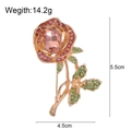 Elegant rose brooch with pink crystals and green rhinestones in golden metal finish - Pink Rose Rhinestone Style (C225-B)