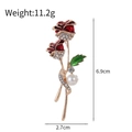 Detail view of red enamel rose brooch with dimensions of 6.9cm height and 2.7cm width - Double Rose Artificial Pearl Rhinestone Style (AL1366-A)