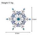 Elegant silver snowflake brooch with sparkling blue rhinestones, size 6.5cm x 5.6cm - Blue Rhinestone Snowflake (C617-A)
