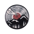 Retro round metal badge featuring a vintage mountain landscape with a large red sun - Retro Red Sun Mountain Style (XZ7200)