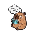 Cartoon enamel pin featuring a capybara reading a book with 'SHH...HE'S READING' bubble - Reading Capybara (QHXZ3662)