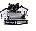 Cute black dragon pin badge resting on books with Book Dragon text decoration - Black Dragon On Books (qhxz4276)