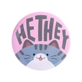 Round pink tinplate badge with HE/THEY pronoun text and cute cartoon cat illustration - HE THEY Cat (MXZ432)