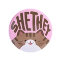 Pink tinplate round pin with cute tabby cat and She/They gender pronoun text - SHE THEY Cat (MXZ433)