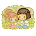 Anime enamel pin featuring cartoon characters with gold alloy chain and floral accents - Character Sharing Scene Badge (xz7254)