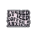 Pink enamel pin featuring Fueled by Iced Coffee & Anxiety text in black bold font - Fueled By Iced Coffee & Anxiety Slogan (xz8780)