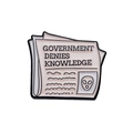 Pink newspaper enamel pin featuring alien design and Government Denies Knowledge text - Denies Knowledge Alien (xz8488)