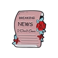 Funny pink enamel scroll brooch pin featuring Breaking News I Don't Care text design - Breaking News Scroll Style (xz8633)