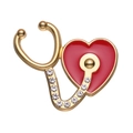 Broche stéthoscope dorée avec un cœur en émail rouge et des cristaux brillants - Stéthoscope Cœur Or Strass (XZ9132)