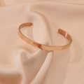 Elegant rose gold stainless steel C-shaped open cuff bracelet for women, adjustable style. - Rose Gold